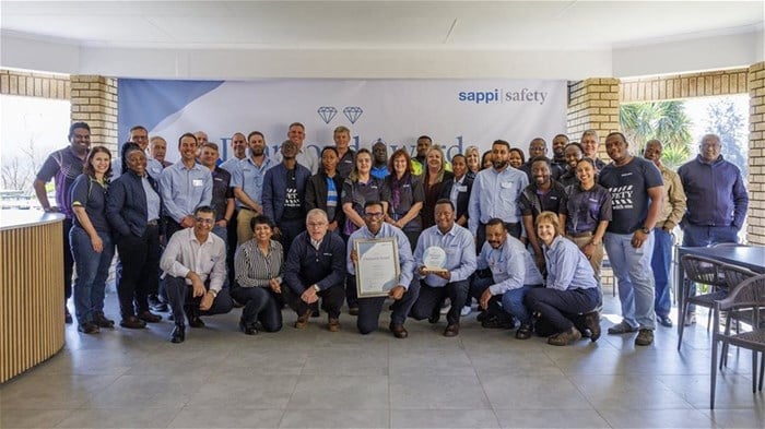 Winning smiles from a powerhouse team—earning the Double Diamond Award is a testament to unwavering dedication and operational excellence.