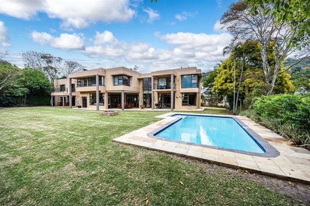 Source: Supplied. Set in Gonubie on the banks of the Gonubie River in East London, this prestigious property offers dual living or potential income generation as it includes a four-bedroom main home plus a spacious three-bedroom second dwelling included on the property. The main house offers functional living areas that open to the patio, lush manicured garden and swimming pool, entertainment area with built-in braai, and a private study. The property offers excellent security, water tanks, irrigation and sprinkler system, a three-phase inverter with batteries and solar panels, and is priced at R4.75m through Pam Golding Properties.