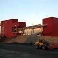 Two loaders work outside the ore processing and recovery plant at De Beers' Snap Lake Diamond Mine, Northwest Territories, Canada. Image credit: , , via Wikimedia Commons