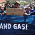 Protesters march during a demonstration in support of Wild Coast communities’ legal battle against Shell’s offshore oil and gas exploration, at the Constitutional Court in Johannesburg. Image credit: Reuters/Alet Pretorius/File Photo