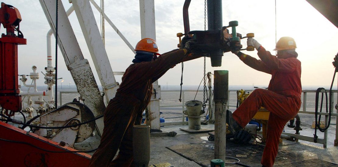 Oil holds near $42 while investors weigh demand against virus